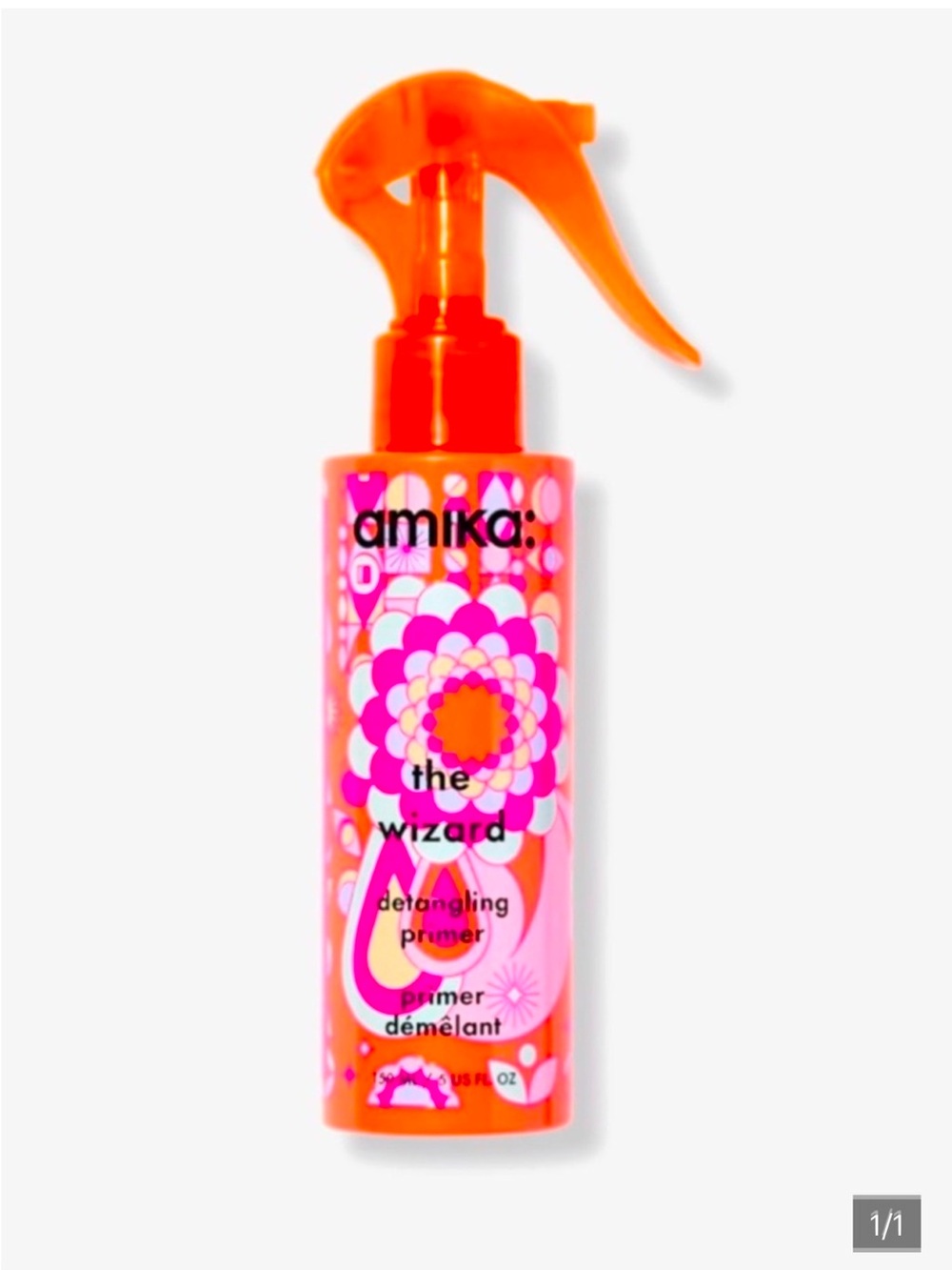 amika The Wizard Detangling Primer Spray - Orange and Pink Bottle